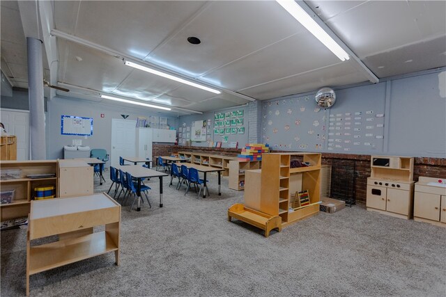 interior space featuring carpet floors and washer / dryer