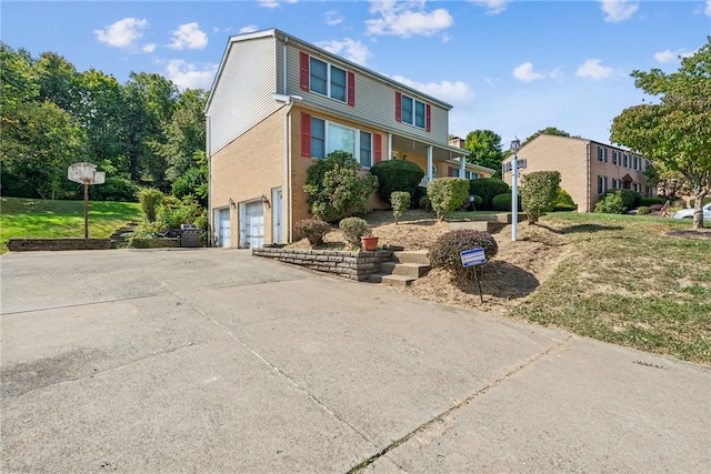 front of property with a garage