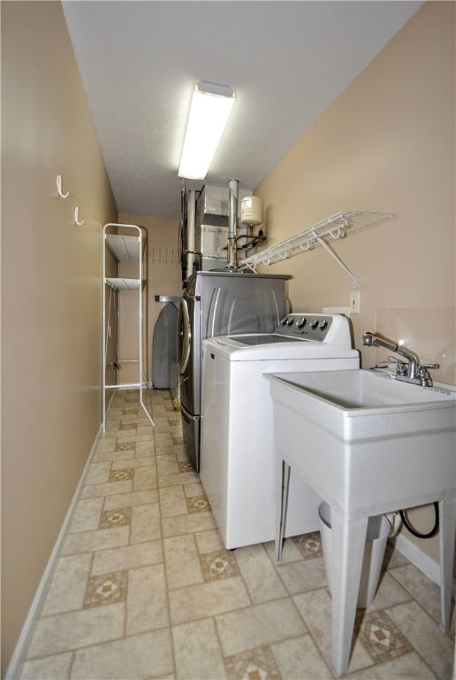 washroom featuring independent washer and dryer