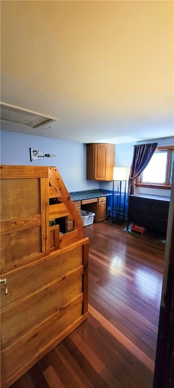 stairs with hardwood / wood-style flooring