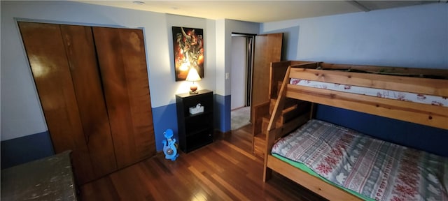 bedroom featuring dark wood-type flooring