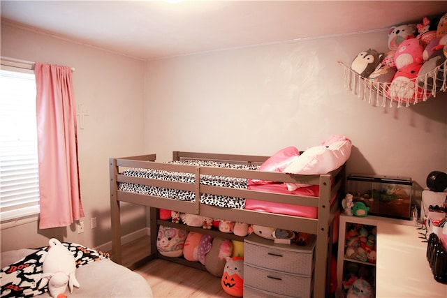 bedroom featuring hardwood / wood-style floors