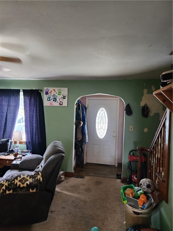 entryway featuring carpet floors and plenty of natural light