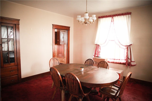 carpeted dining space with an inviting chandelier and a wealth of natural light