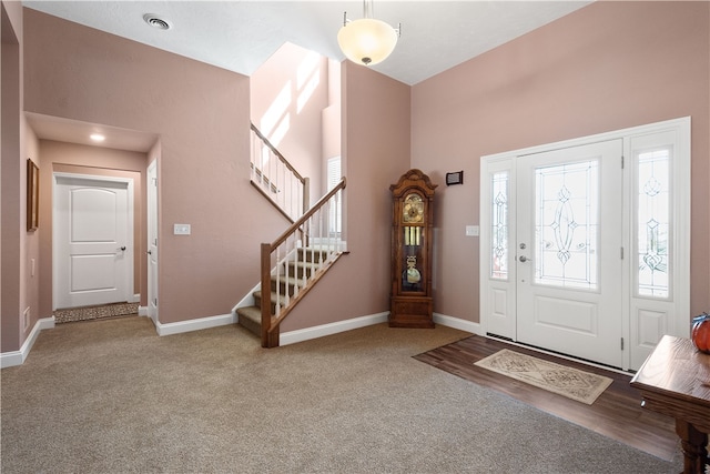 view of carpeted foyer