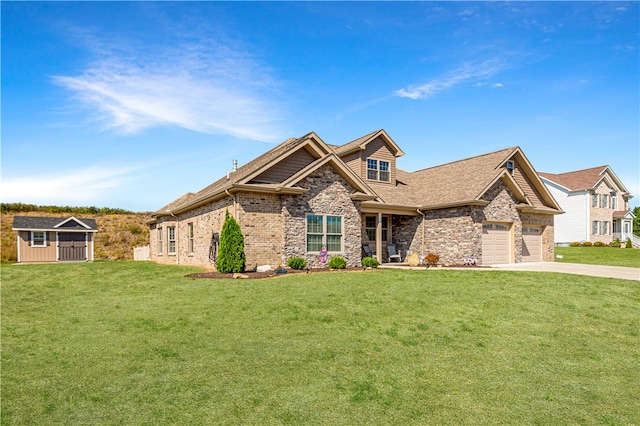 view of front of home with a garage and a front lawn