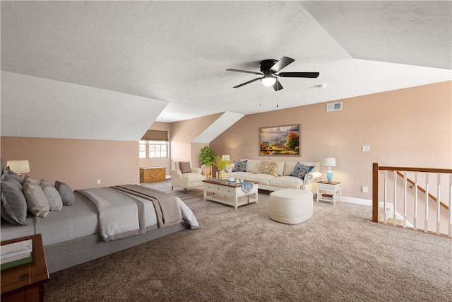 bedroom featuring lofted ceiling, carpet flooring, and ceiling fan