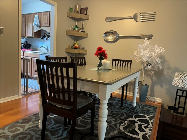 dining room featuring hardwood / wood-style flooring