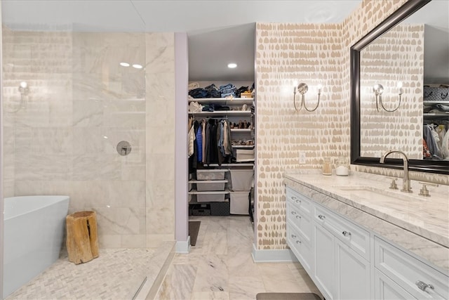 bathroom with vanity and plus walk in shower