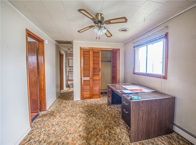 game room with carpet floors, ceiling fan, and a baseboard radiator