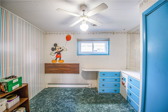 home office featuring dark carpet, baseboard heating, and ceiling fan