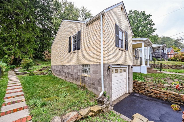 view of home's exterior with a garage