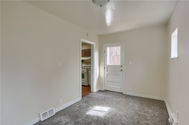 empty room with carpet flooring