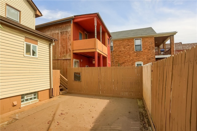 exterior space with a balcony