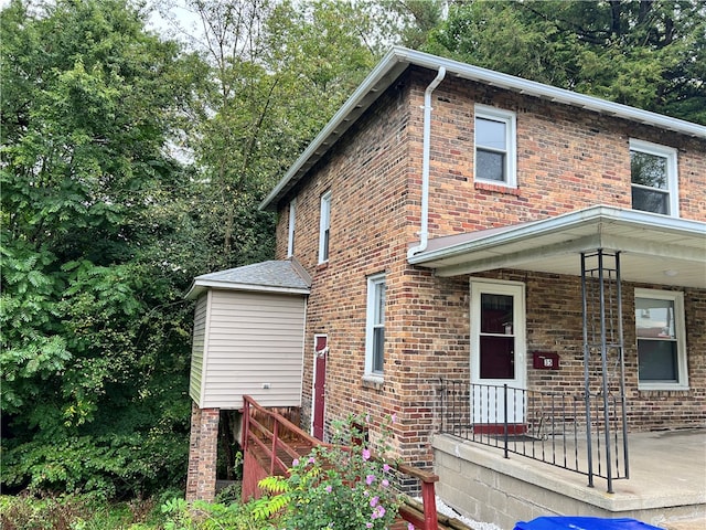 view of home's exterior featuring a porch