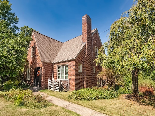 view of home's exterior featuring a lawn