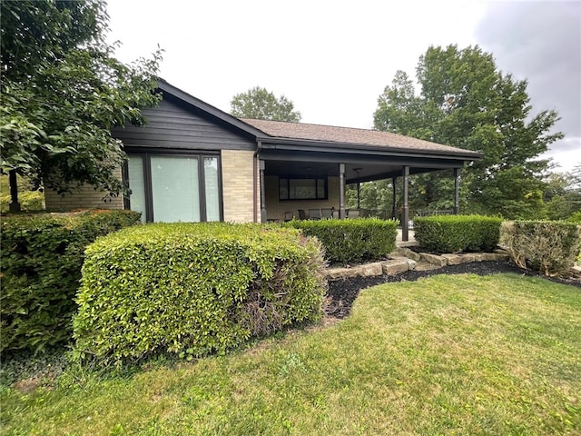 view of outdoor structure with a yard