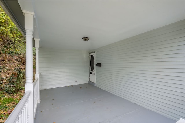 view of patio featuring a porch