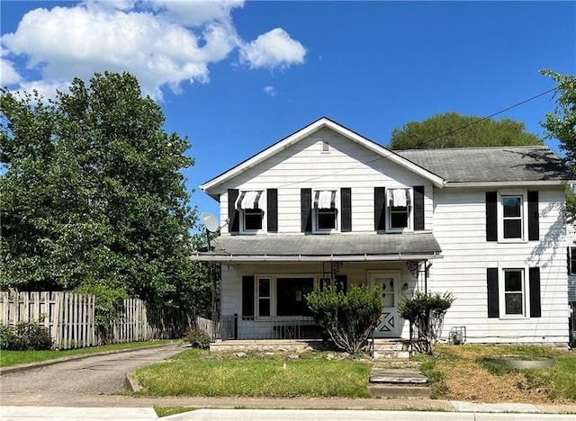 view of front of property featuring covered porch