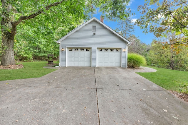 garage with a lawn