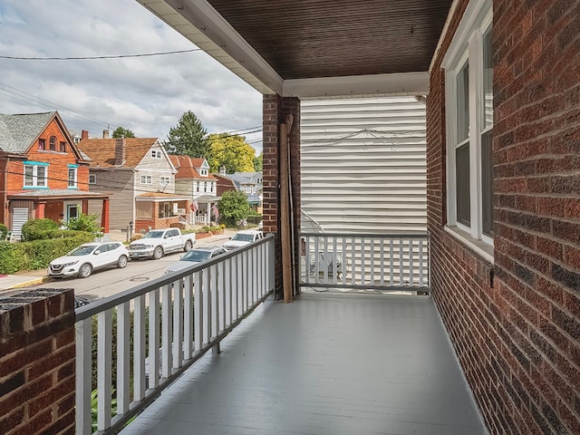 balcony featuring a porch