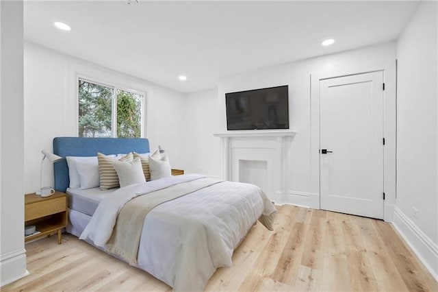 bedroom featuring light wood-type flooring