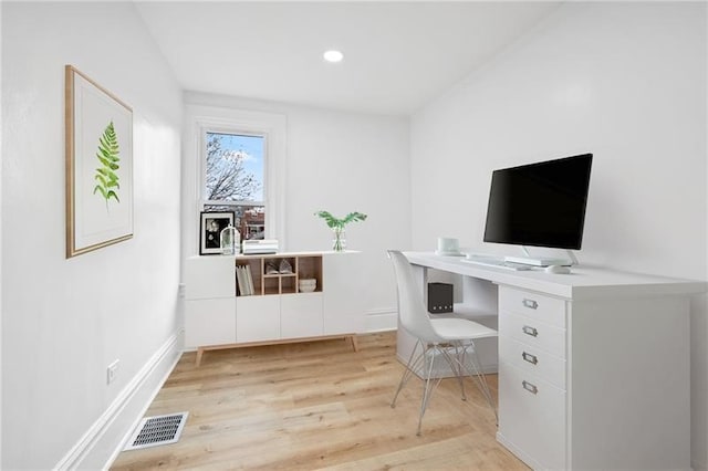 home office featuring light hardwood / wood-style flooring