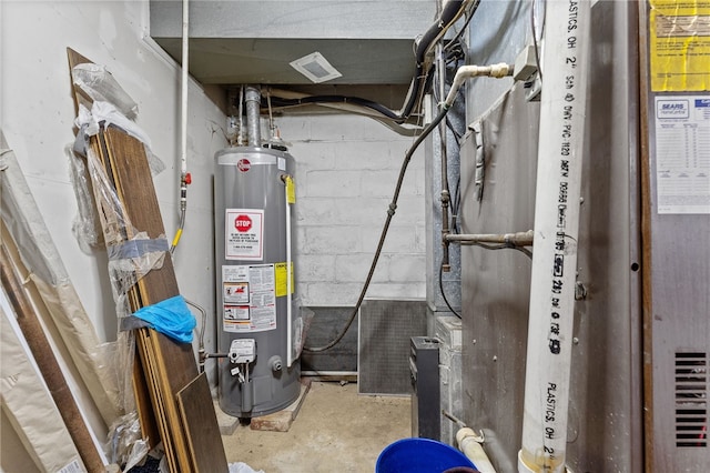 utility room with water heater and heating unit