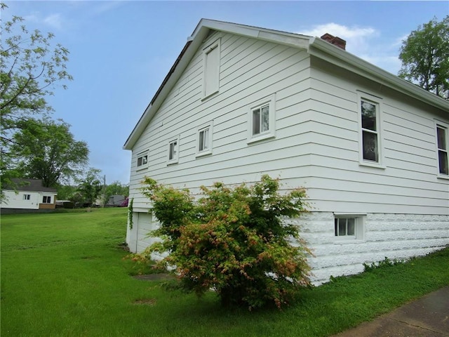 6129 State Route 88, Union Twp Wsh, PA 15332 - view of home's exterior featuring a chimney, a yard, and an attached garage