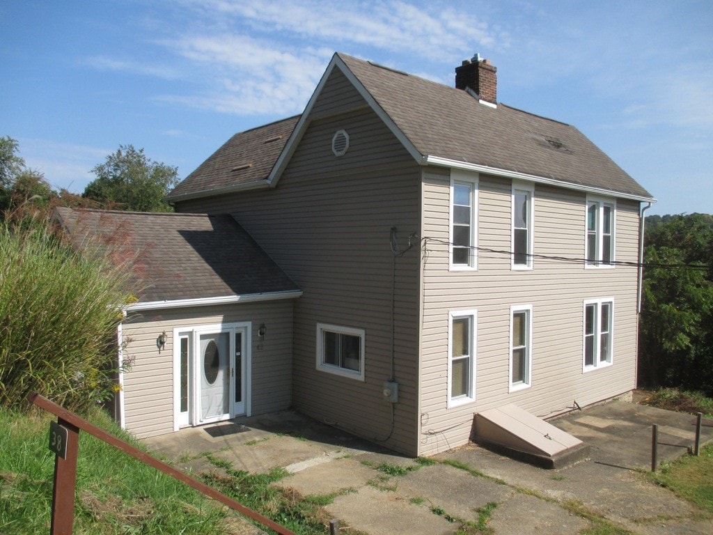 back of house featuring a patio