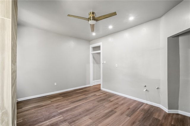 unfurnished room featuring hardwood / wood-style floors and ceiling fan