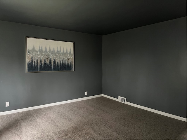 unfurnished room featuring carpet floors