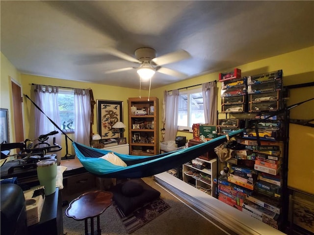 interior space featuring plenty of natural light and ceiling fan