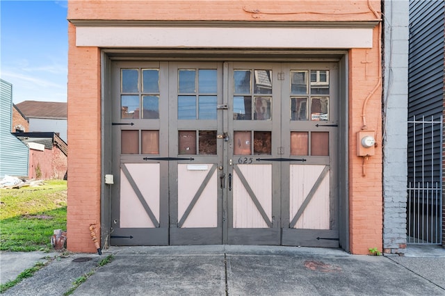 property entrance featuring french doors