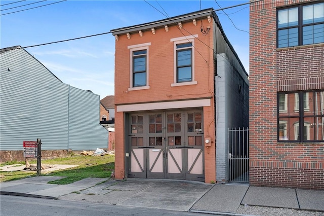 622 Emlin St, East Allegheny, PA 15212 - view of front facade with driveway and brick siding