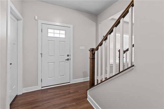 entrance foyer featuring dark hardwood / wood-style floors