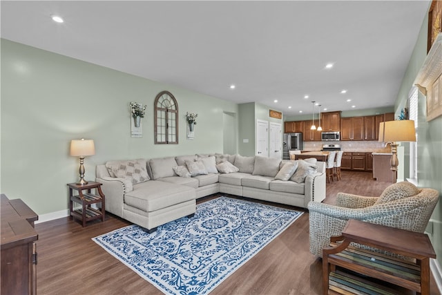 living room featuring dark hardwood / wood-style flooring