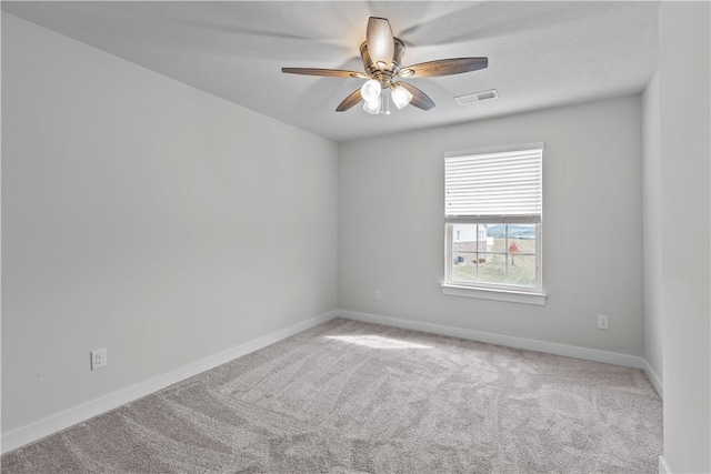 empty room with carpet floors and ceiling fan