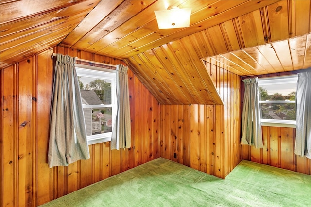 bonus room with carpet, lofted ceiling, wooden walls, and wood ceiling