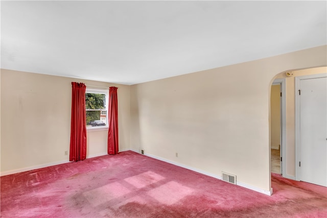 unfurnished room featuring carpet floors