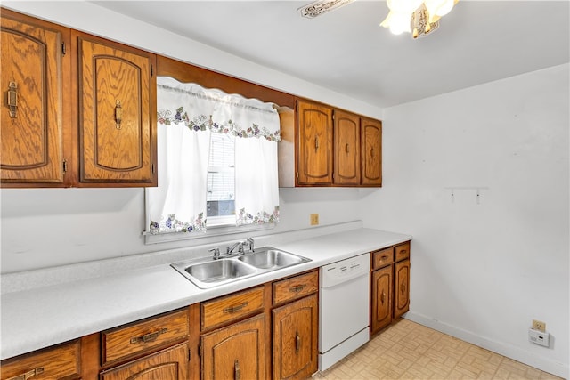 kitchen with white dishwasher and sink