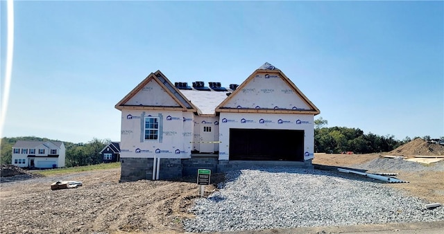 property in mid-construction featuring a garage