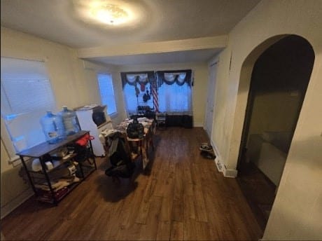 corridor featuring dark hardwood / wood-style floors