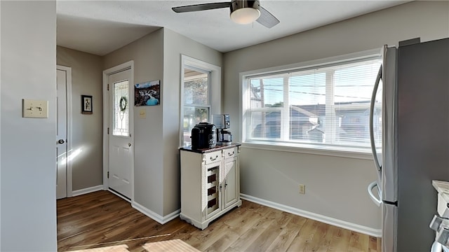 interior space featuring light hardwood / wood-style flooring and ceiling fan