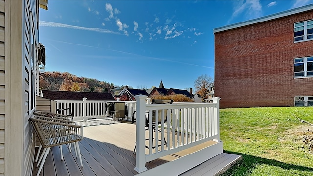 deck featuring a lawn