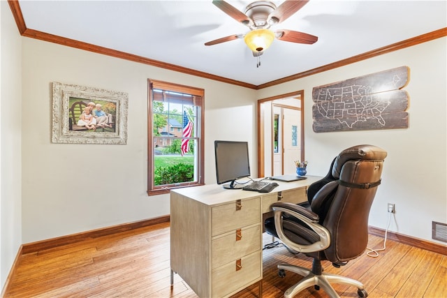 office with ornamental molding, ceiling fan, and light hardwood / wood-style flooring