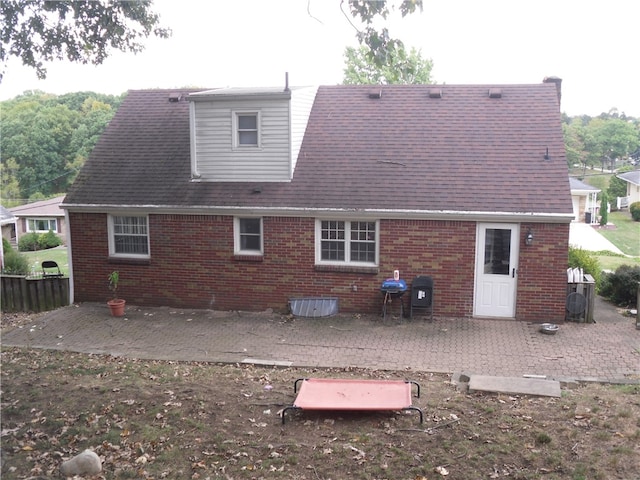 rear view of house with a patio