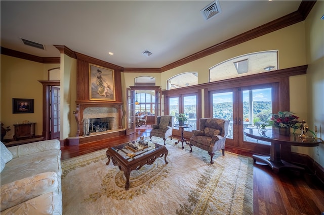 living room featuring ornamental molding and dark hardwood / wood-style floors