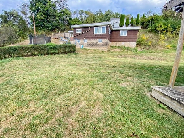 view of yard featuring a trampoline