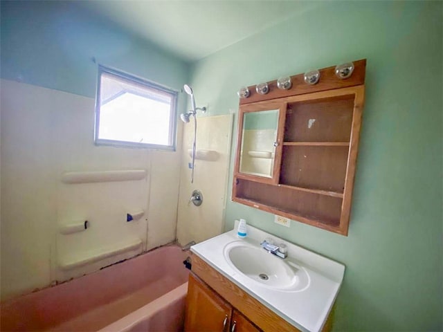 bathroom with vanity and  shower combination